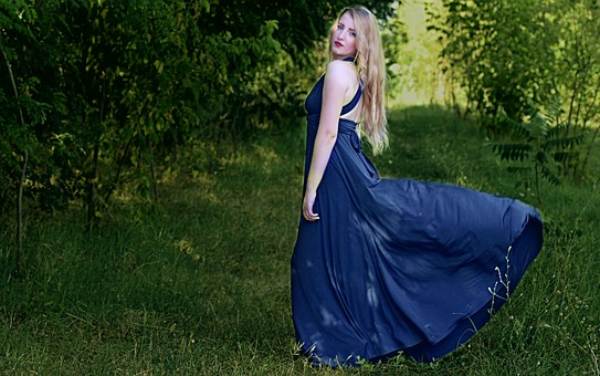 winter wedding outfits woman wearing blue outfit