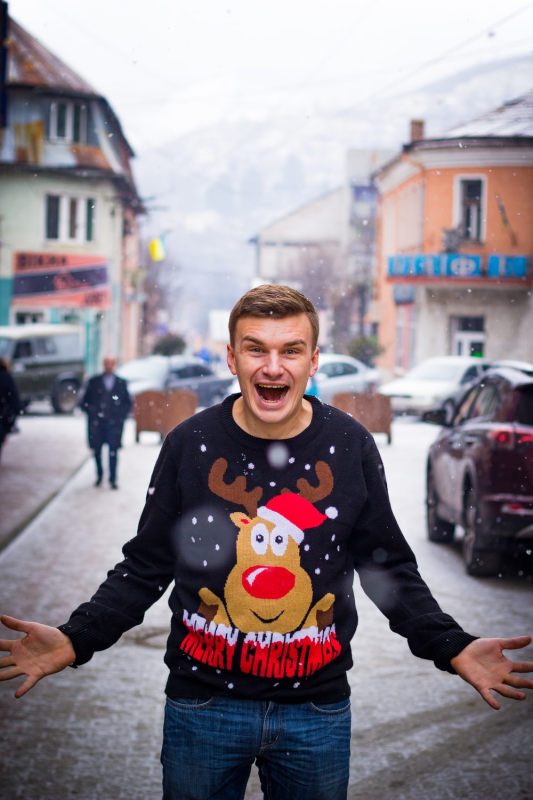 man in festive sweater