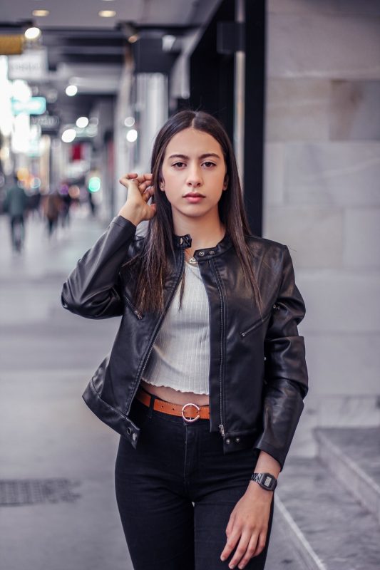 how to wear casual winter outfits woman in leather jacket