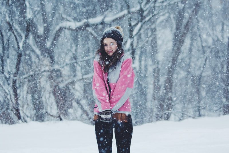 snow jackets-girl standing in snow