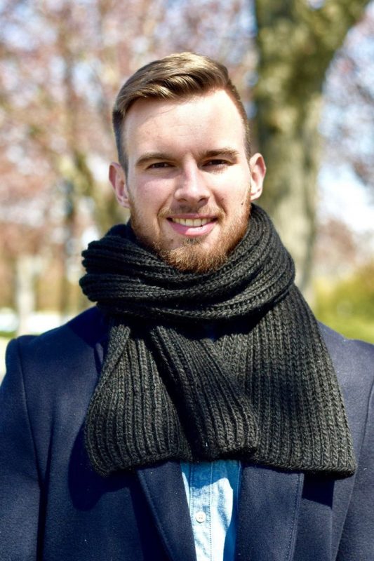 man in woollen scarf