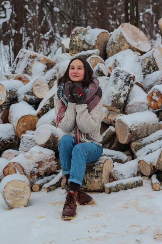 woman wearing a scarf with a sweater