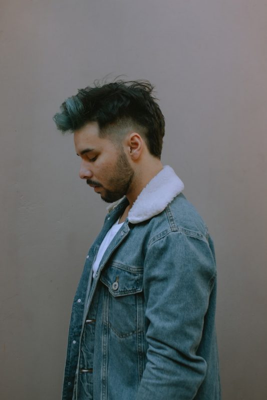 man wearing a denim jacket