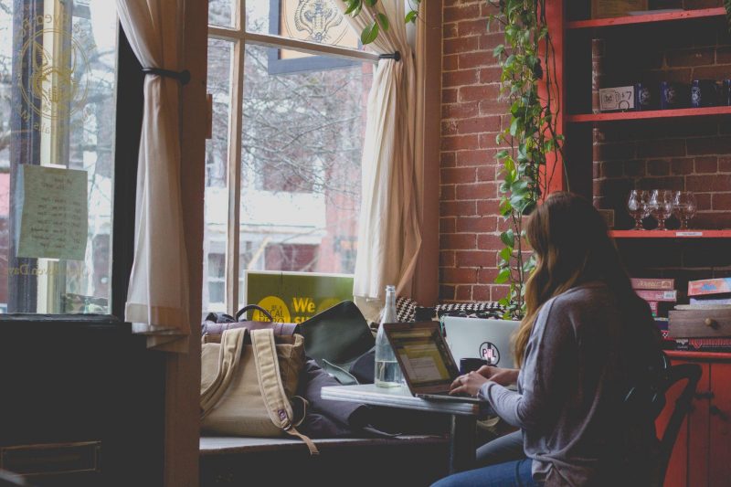 girl reading on laptop