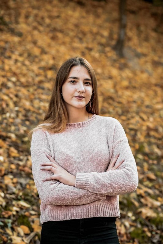 woman posing in a sweater