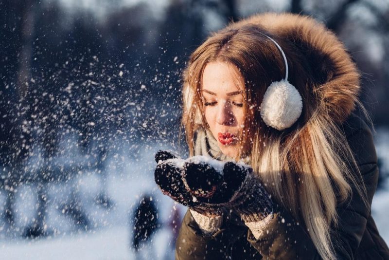 woman wearing earmuffs