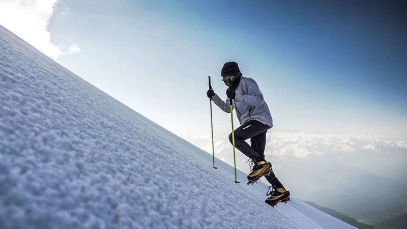 athlete climbing Friendship Peak