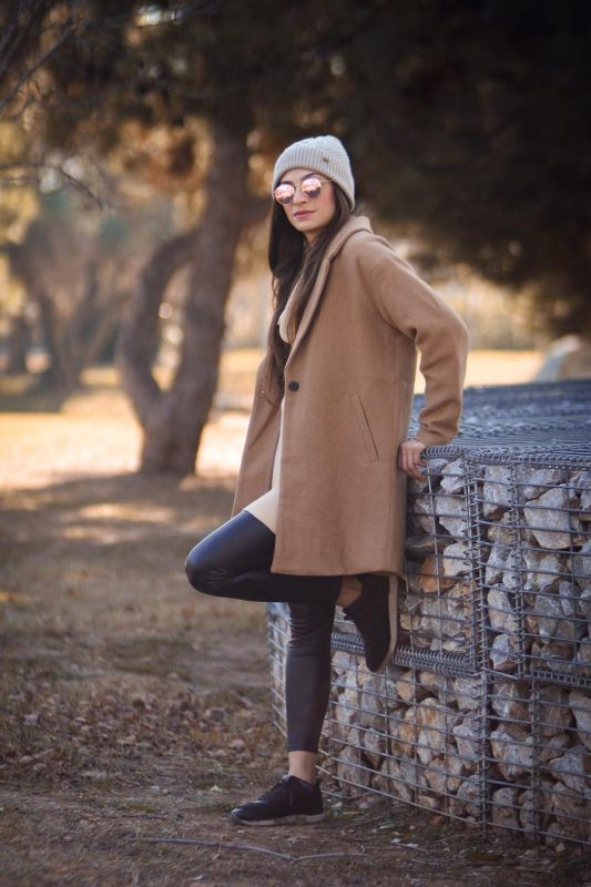 woman in a winter coat for fancy classy winter outfits